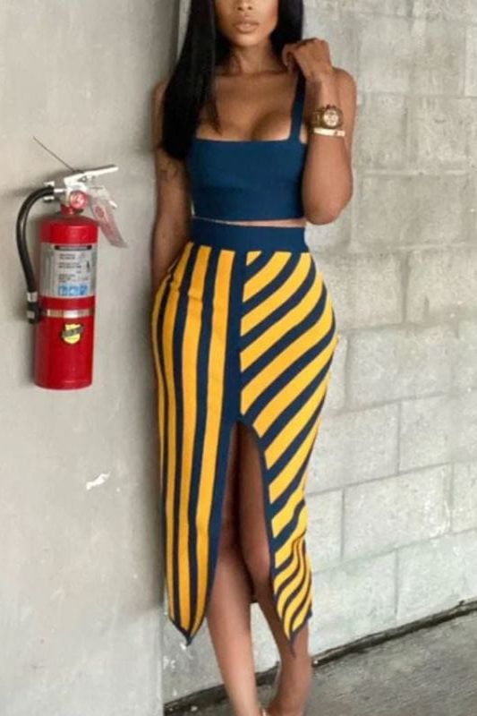 Woman wearing a figure flattering  Nadia Bandage Crop Top and Midi Skirt Set - Royal Blue BODYCON COLLECTION