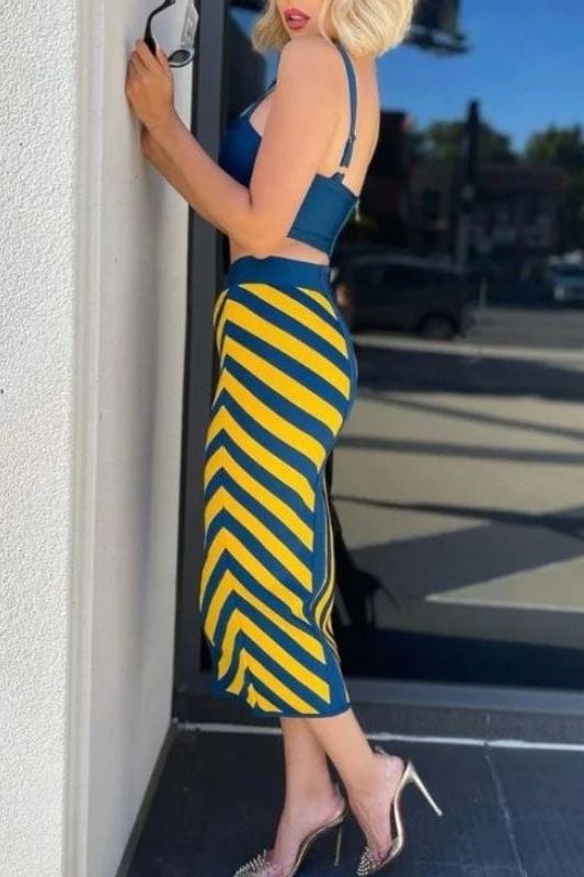 Woman wearing a figure flattering  Nadia Bandage Crop Top and Midi Skirt Set - Royal Blue BODYCON COLLECTION