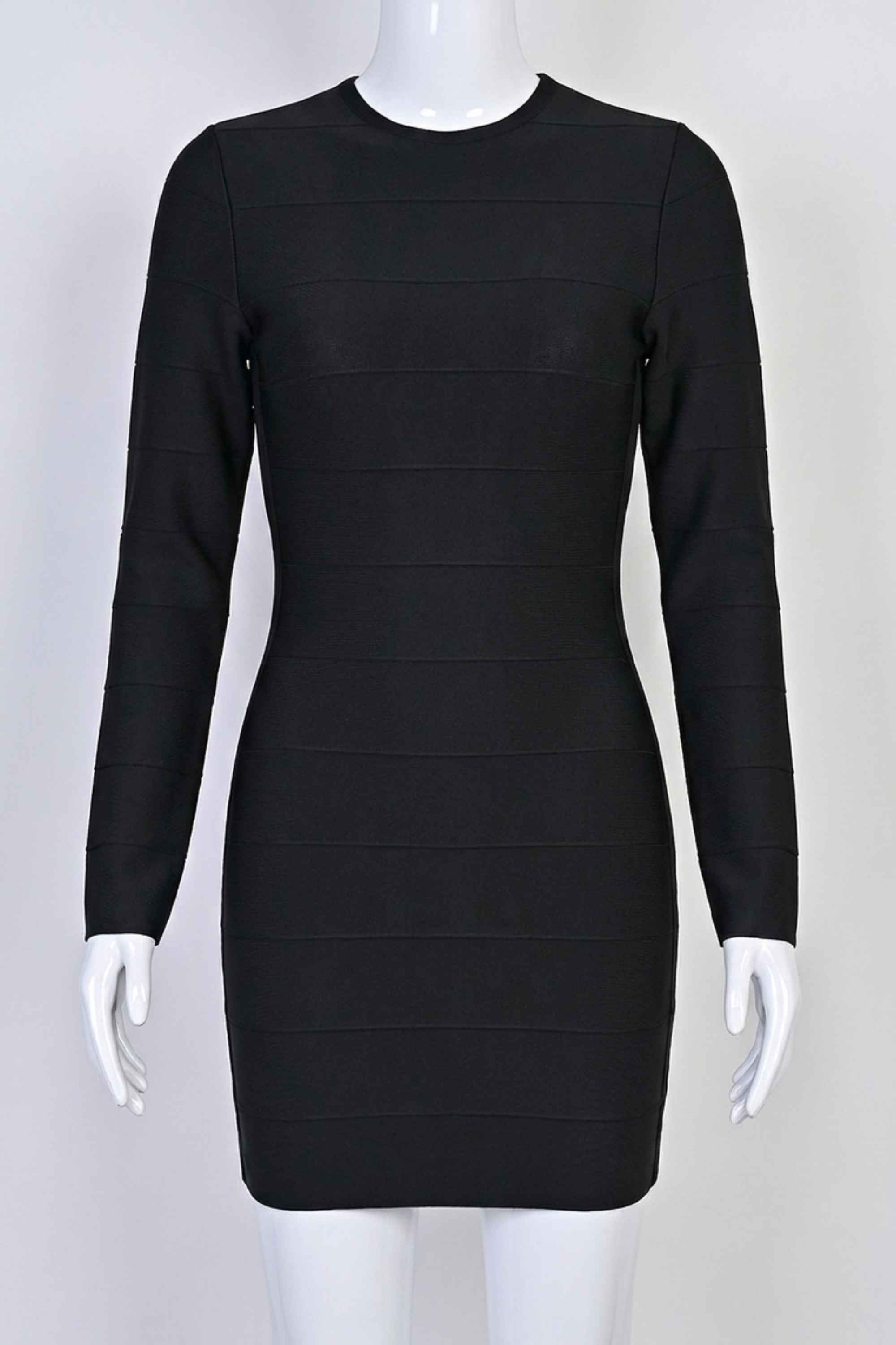 Woman wearing a figure flattering  Pamela Long Sleeve Bandage Mini Dress - Classic Black BODYCON COLLECTION
