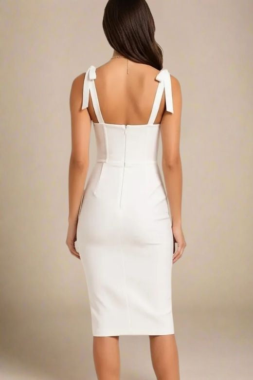 Woman wearing a figure flattering  Payton Bandage Dress - Pearl White BODYCON COLLECTION