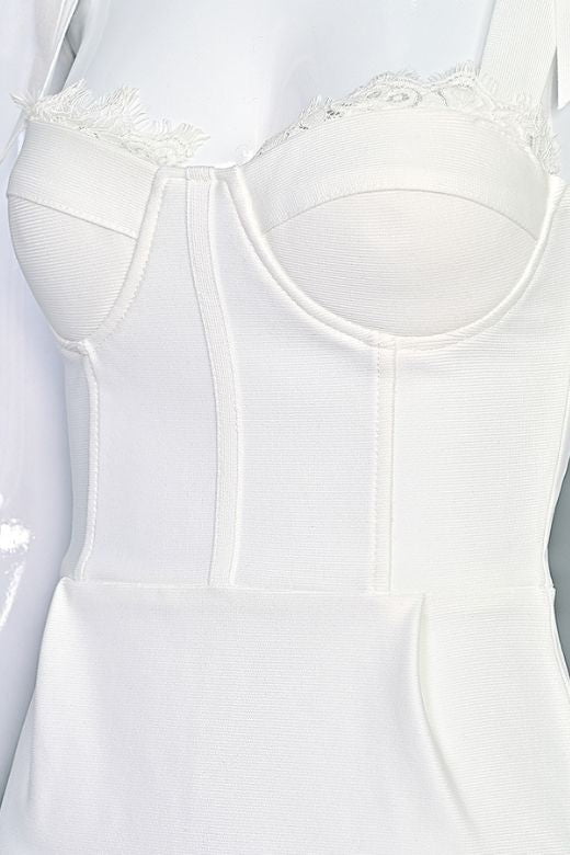 Woman wearing a figure flattering  Payton Bandage Dress - White Pearl BODYCON COLLECTION