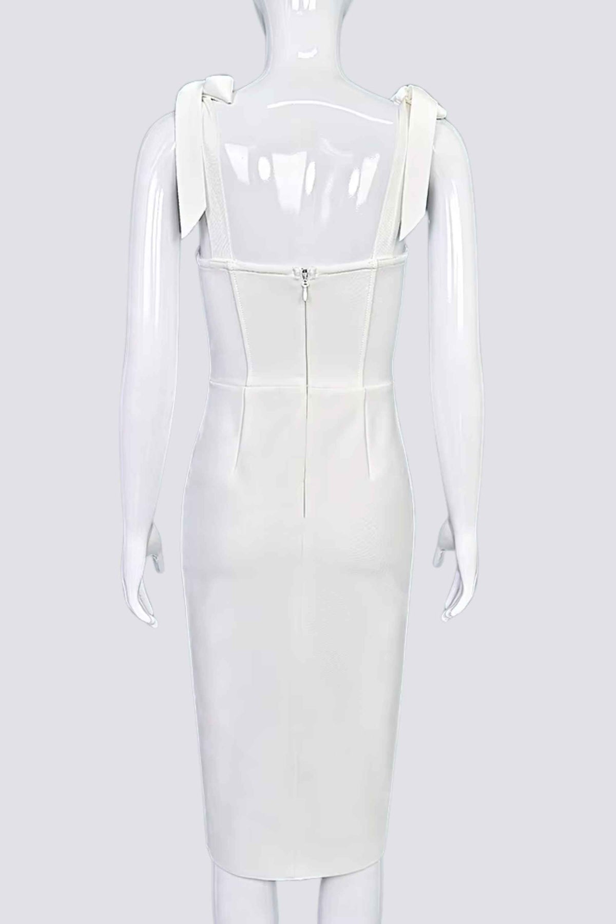 Woman wearing a figure flattering  Payton Bandage Dress - White Pearl BODYCON COLLECTION