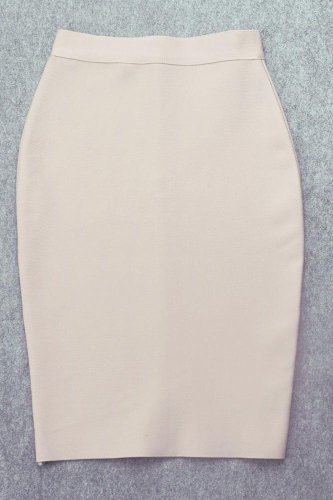 Woman wearing a figure flattering  Pencil High Waist Bandage Knee Length Skirt - Cream BODYCON COLLECTION