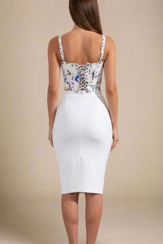 Woman wearing a figure flattering  Penny Top - White Floral BODYCON COLLECTION Pty Ltd