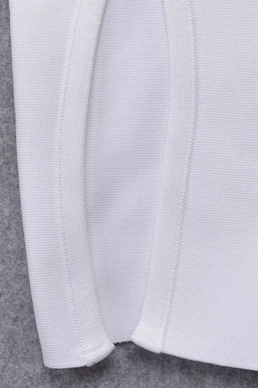 Woman wearing a figure flattering  Pia Bandage Dress - White Pearl BODYCON COLLECTION