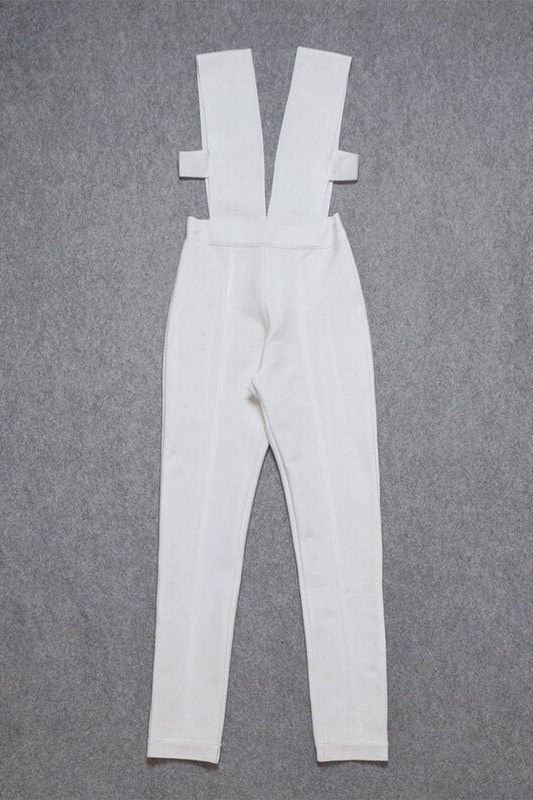 Woman wearing a figure flattering  Pia Bandage Pants Jumpsuit - Pearl White BODYCON COLLECTION