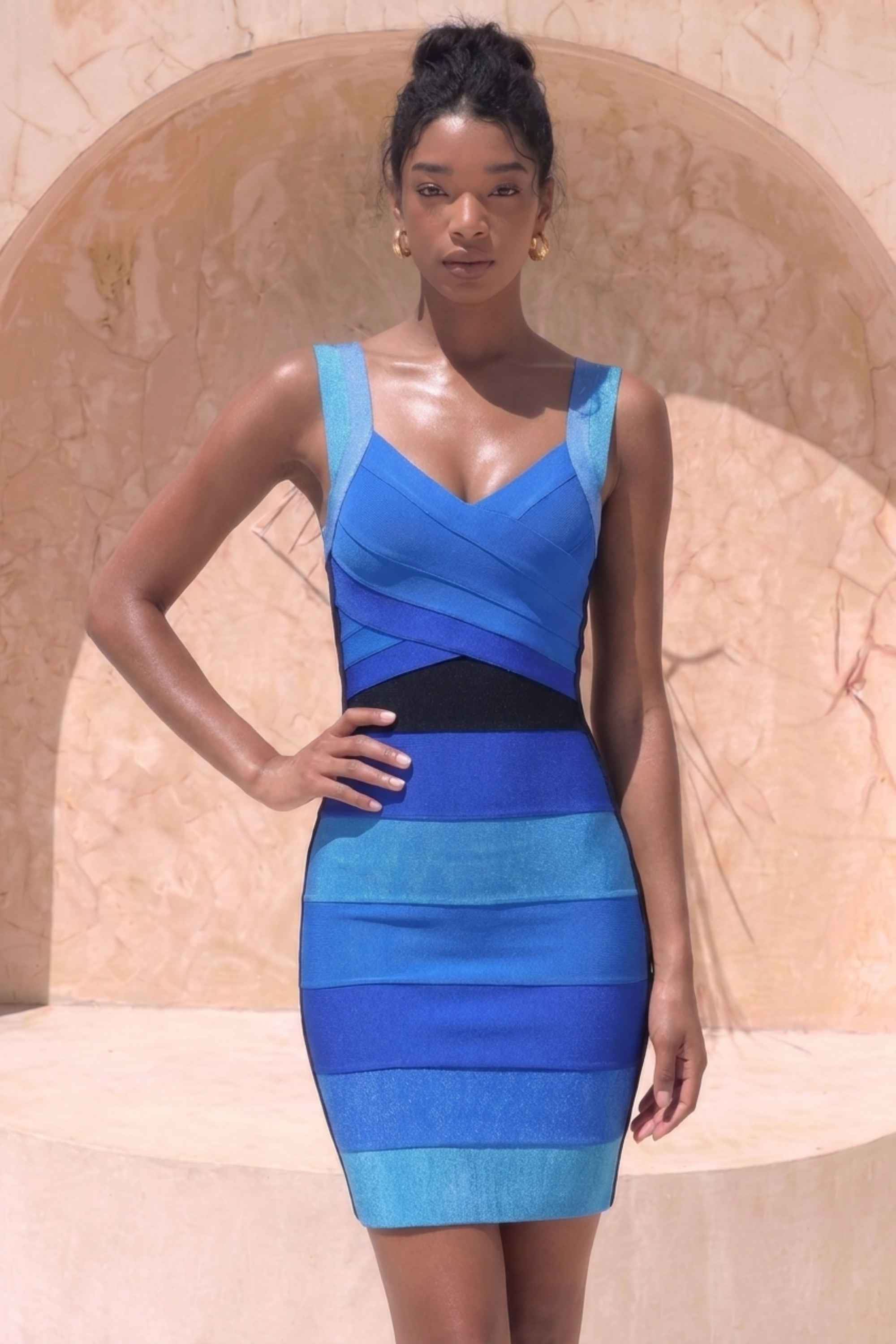 Woman wearing a figure flattering  Portia Bandage Mini Dress - Royal Blue BODYCON COLLECTION Pty Ltd