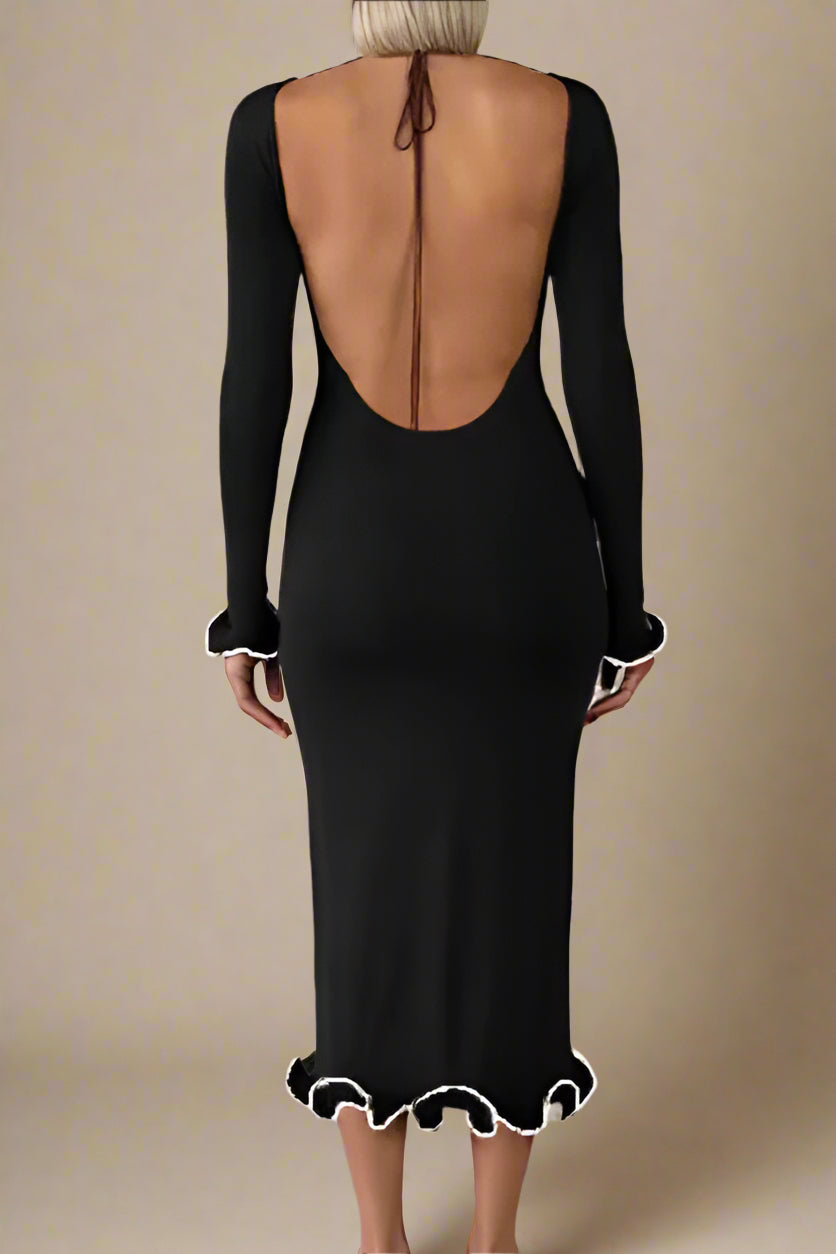 Woman wearing a figure flattering  Regina Long Sleeve Bodycon Maxi Dress - Classic Black BODYCON COLLECTION