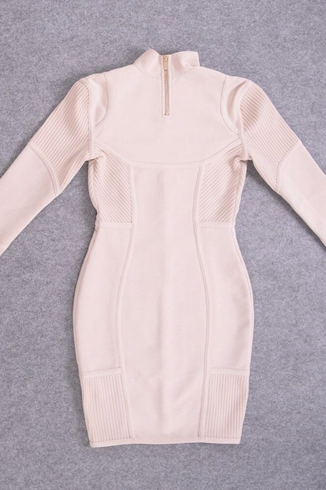 Woman wearing a figure flattering  Roxie Long Sleeve Bodycon Mini Dress - Cream Bodycon Collection