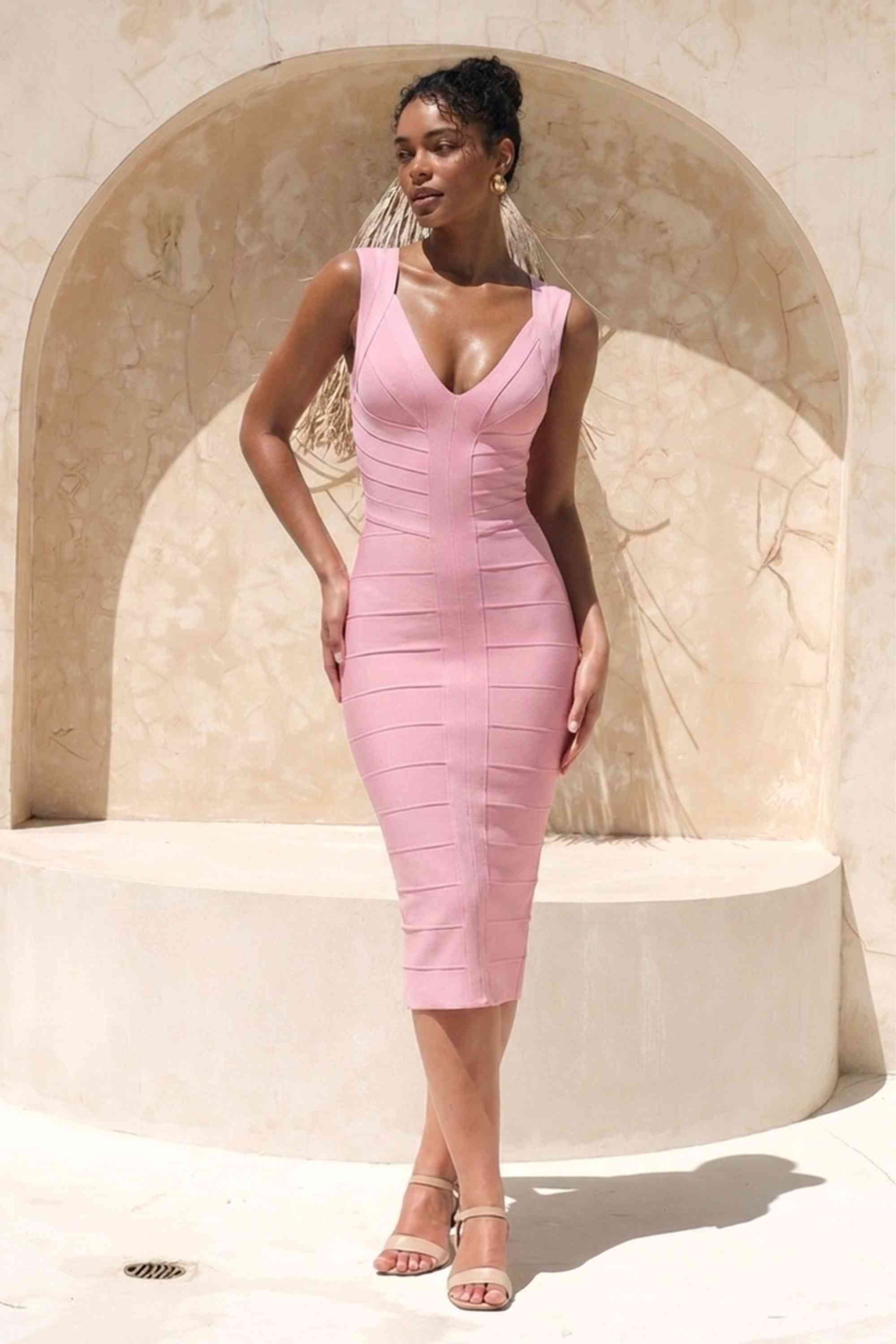 Woman wearing a figure flattering  Sabrina Bandage Midi Dress - Dusty Pink BODYCON COLLECTION Pty Ltd