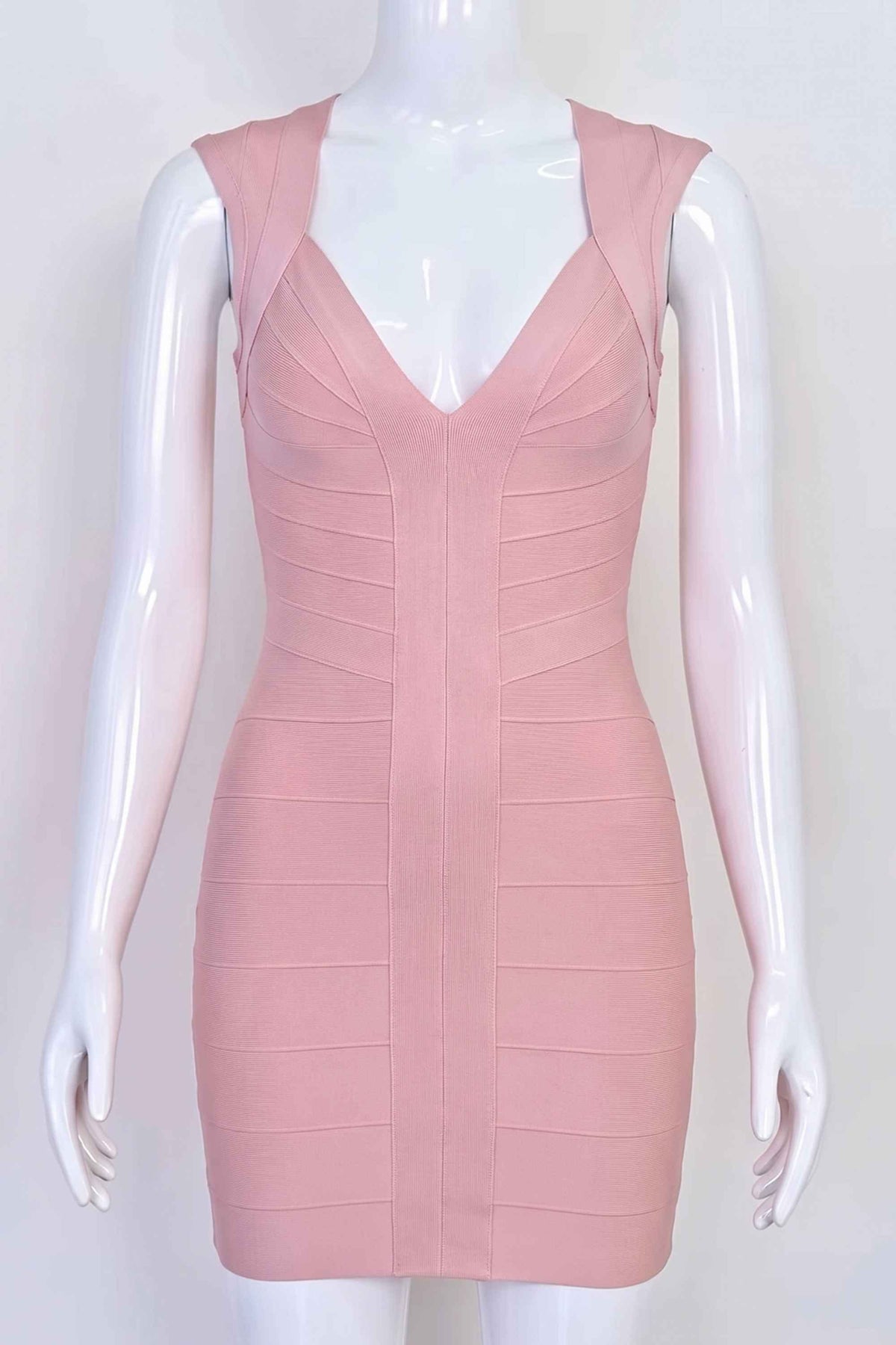 Woman wearing a figure flattering  Sabrina Bandage Mini Dress - Pale Pink BODYCON COLLECTION Pty Ltd