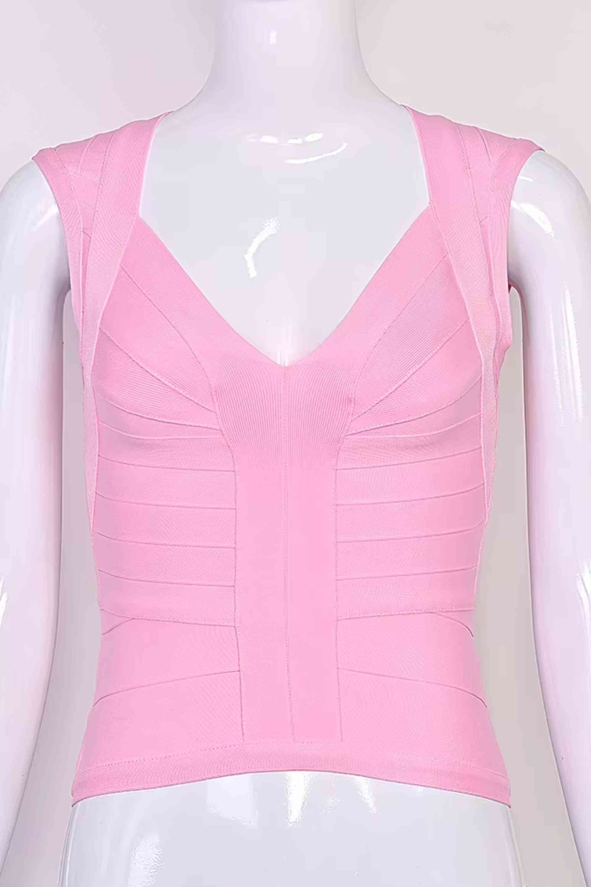 Woman wearing a figure flattering  Sabrina Bandage Top - Dusty Pink BODYCON COLLECTION Pty Ltd