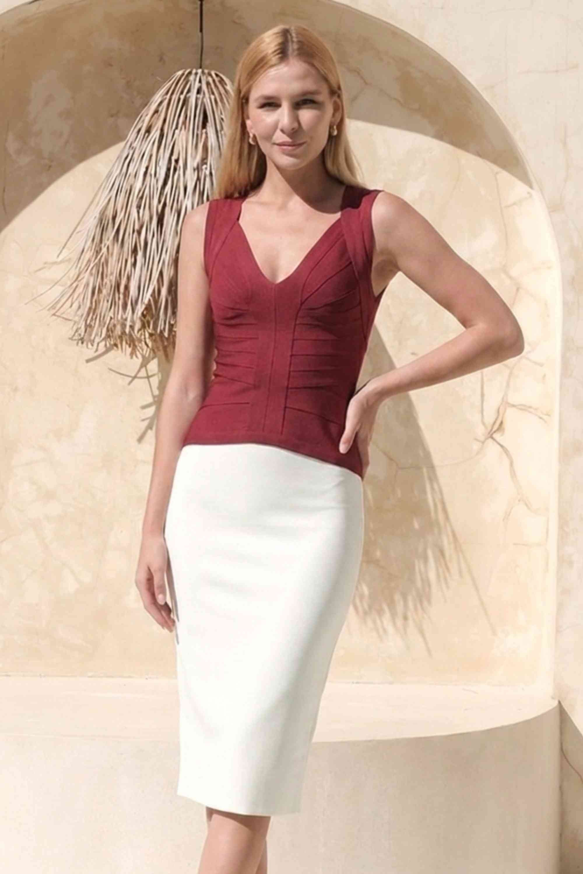 Woman wearing a figure flattering  Sabrina Bandage Top - Red Wine BODYCON COLLECTION Pty Ltd