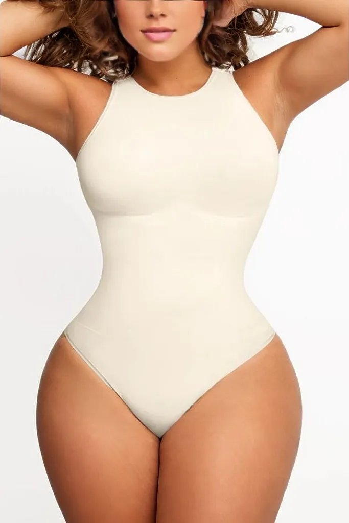 Woman wearing a figure flattering  Sculpting High Neck One Piece Bodysuit Shapewear - Panties Bodycon Collection