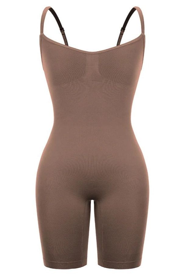Woman wearing a figure flattering  Sculpting One Piece Bodysuit Shapewear - Mid Thigh Bodycon Collection