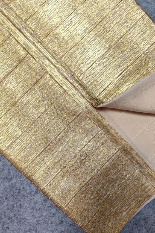 Woman wearing a figure flattering  Selene Bandage Crop Top and Midi Skirt Set - Gold BODYCON COLLECTION Pty Ltd