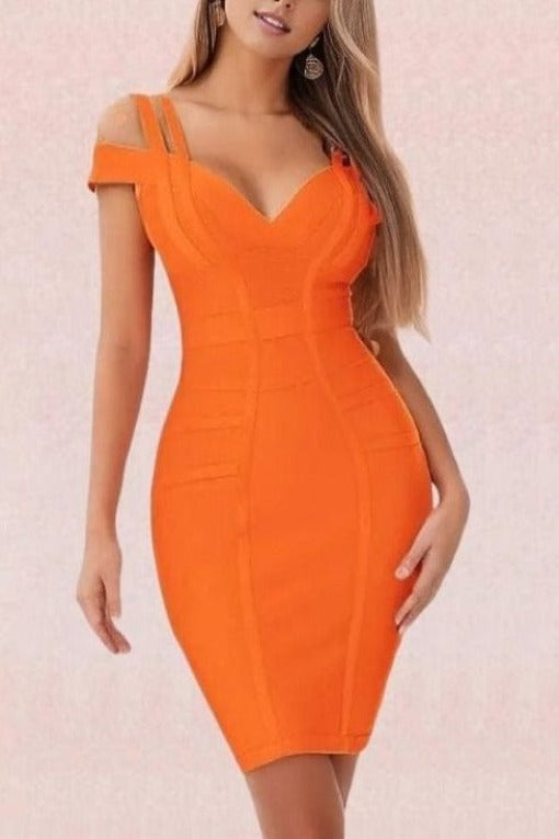 Woman wearing a figure flattering  Sia Bandage Dress - Apricot Orange Bodycon Collection