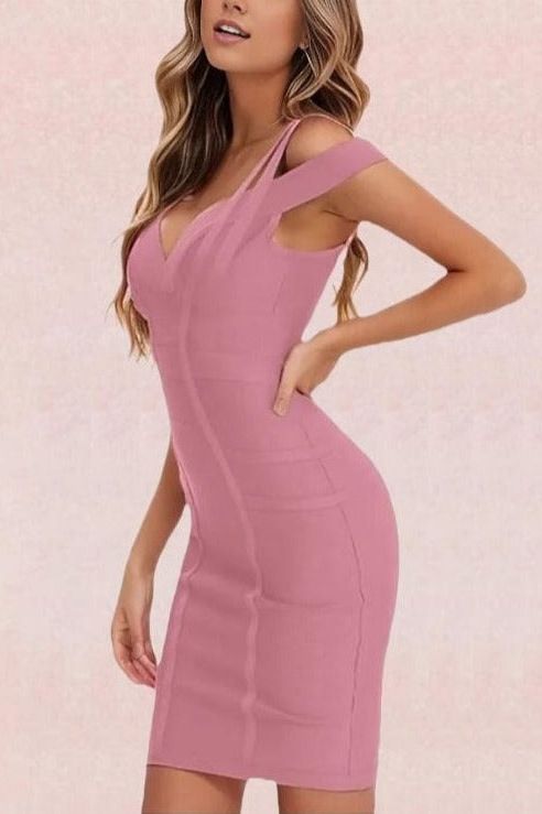 Woman wearing a figure flattering  Sia Bandage Dress - Ballet Pink Bodycon Collection