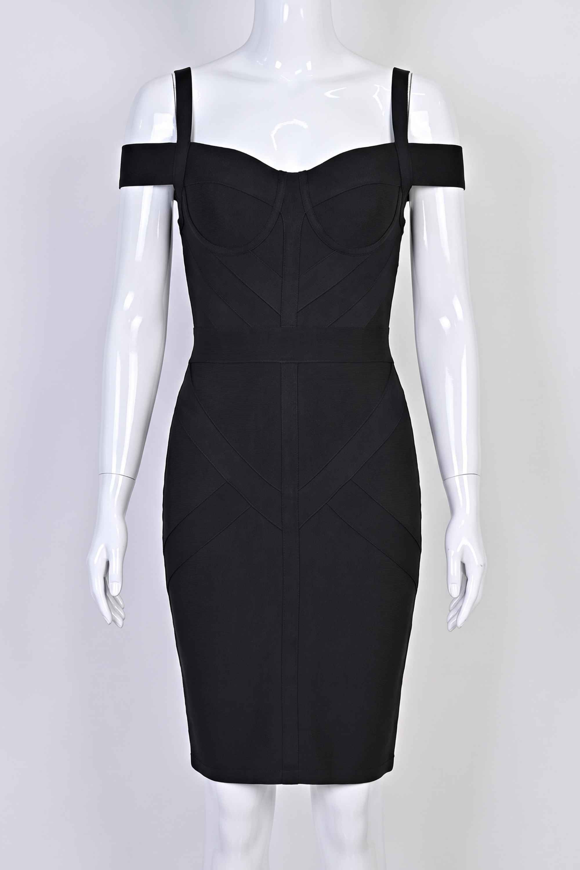 Woman wearing a figure flattering  Sophia Bandage Dress - Classic Black Bodycon Collection