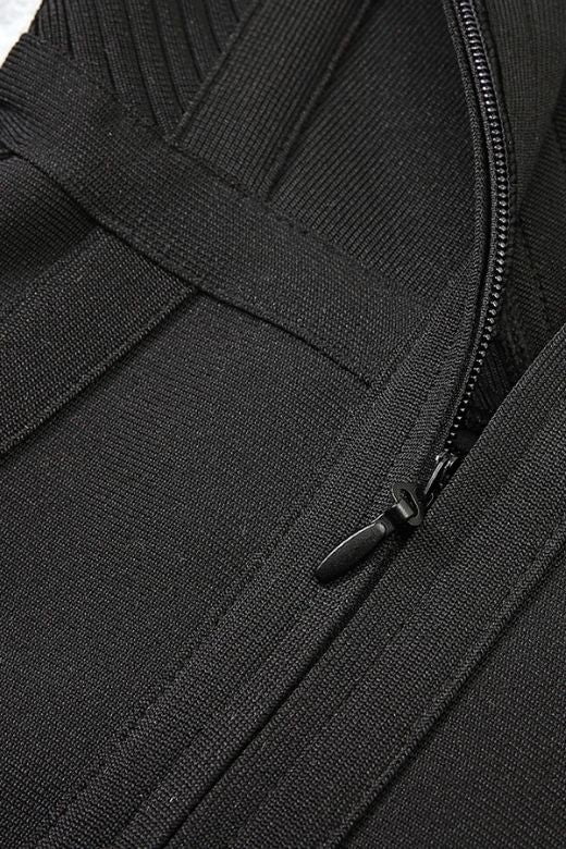 Woman wearing a figure flattering  Sophia Bandage Mini Dress - Classic Black Bodycon Collection