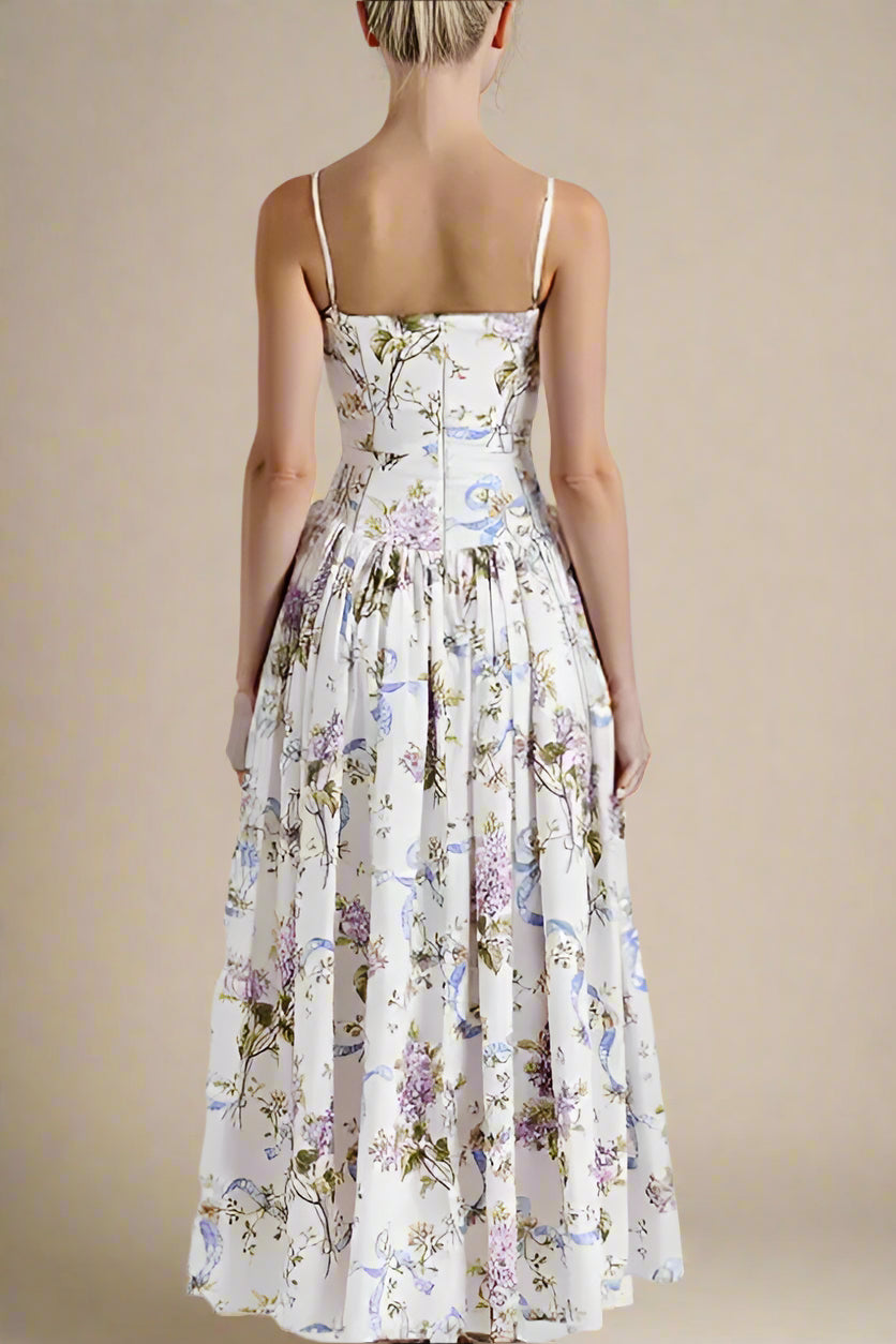 Woman wearing a figure flattering  Tasmin Bodycon Midi Dress - White Floral BODYCON COLLECTION