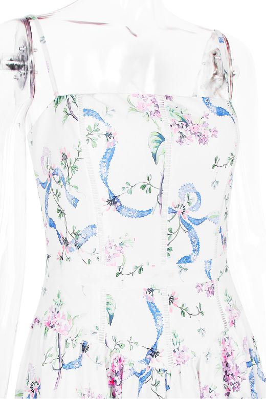 Woman wearing a figure flattering  Tasmin Bodycon Midi Dress - White Floral BODYCON COLLECTION