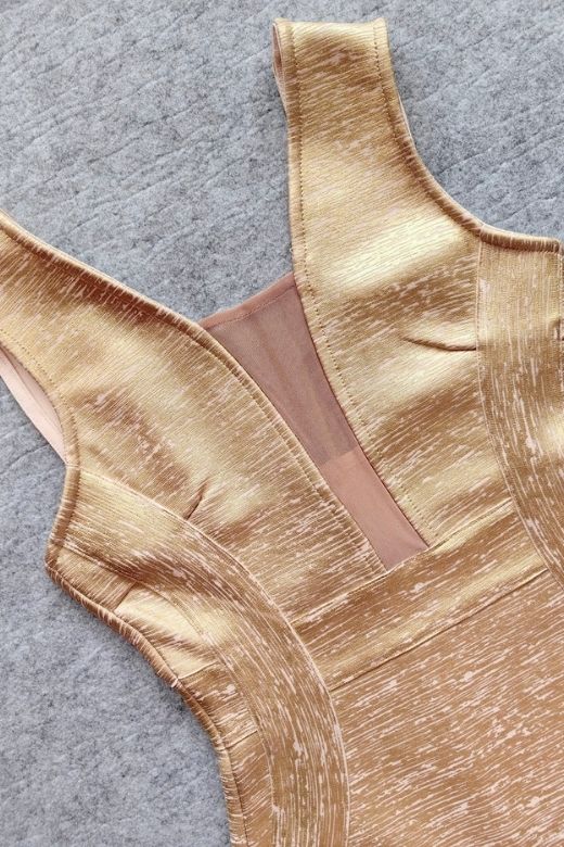 Woman wearing a figure flattering  Tyler Bodycon Dress - Gold BODYCON COLLECTION Pty Ltd