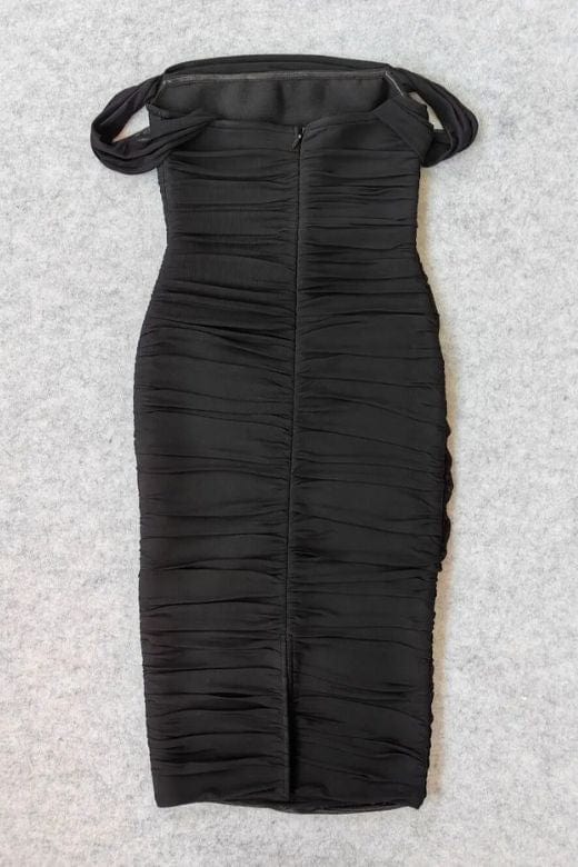 Woman wearing a figure flattering  Zia Bodycon Wrap Midi Dress - Classic Black Bodycon Collection