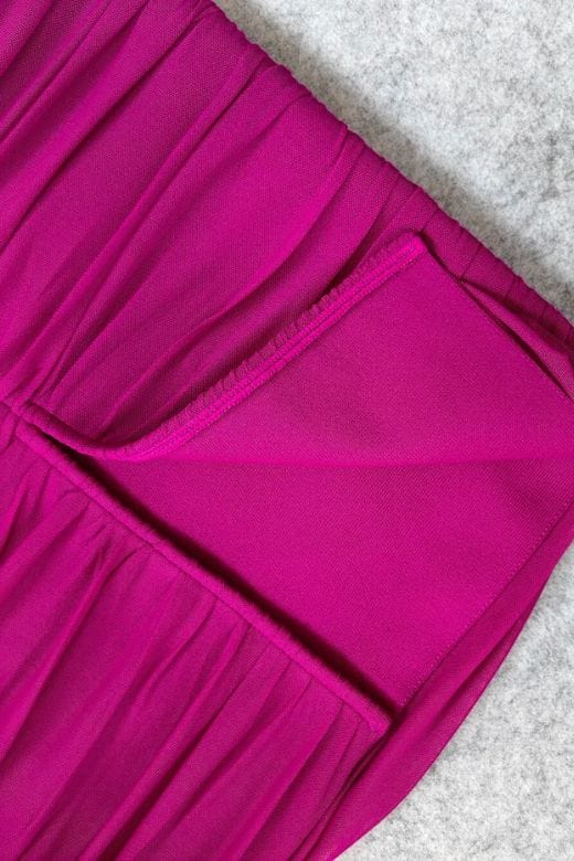 Woman wearing a figure flattering  Zia Bodycon Wrap Midi Dress - Magenta Pink Bodycon Collection